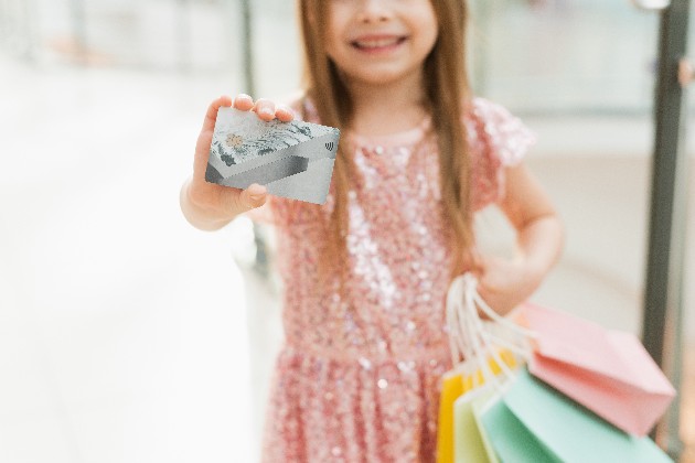Should you get a prepaid card for your kids? (pros + cons)
